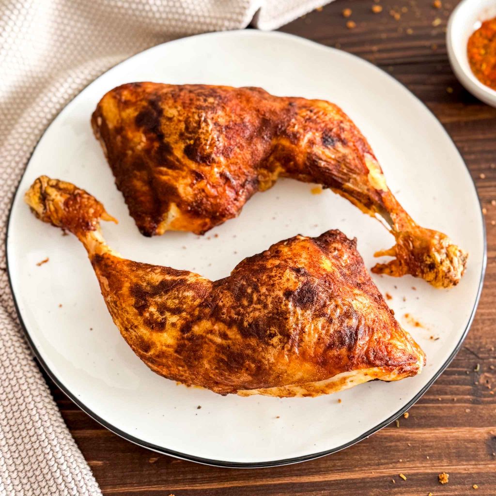 Hähnchenschenkel aus der Heißluftfritteuse 2 Hähnchenschenkel Airfryer Rezept